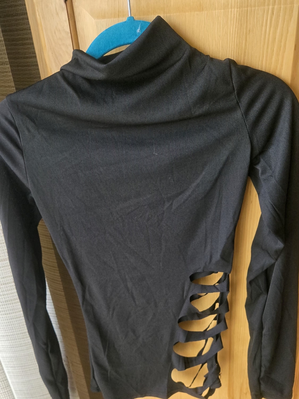 Black Long-Sleeve Turtleneck Top with Side Ladder Cutouts